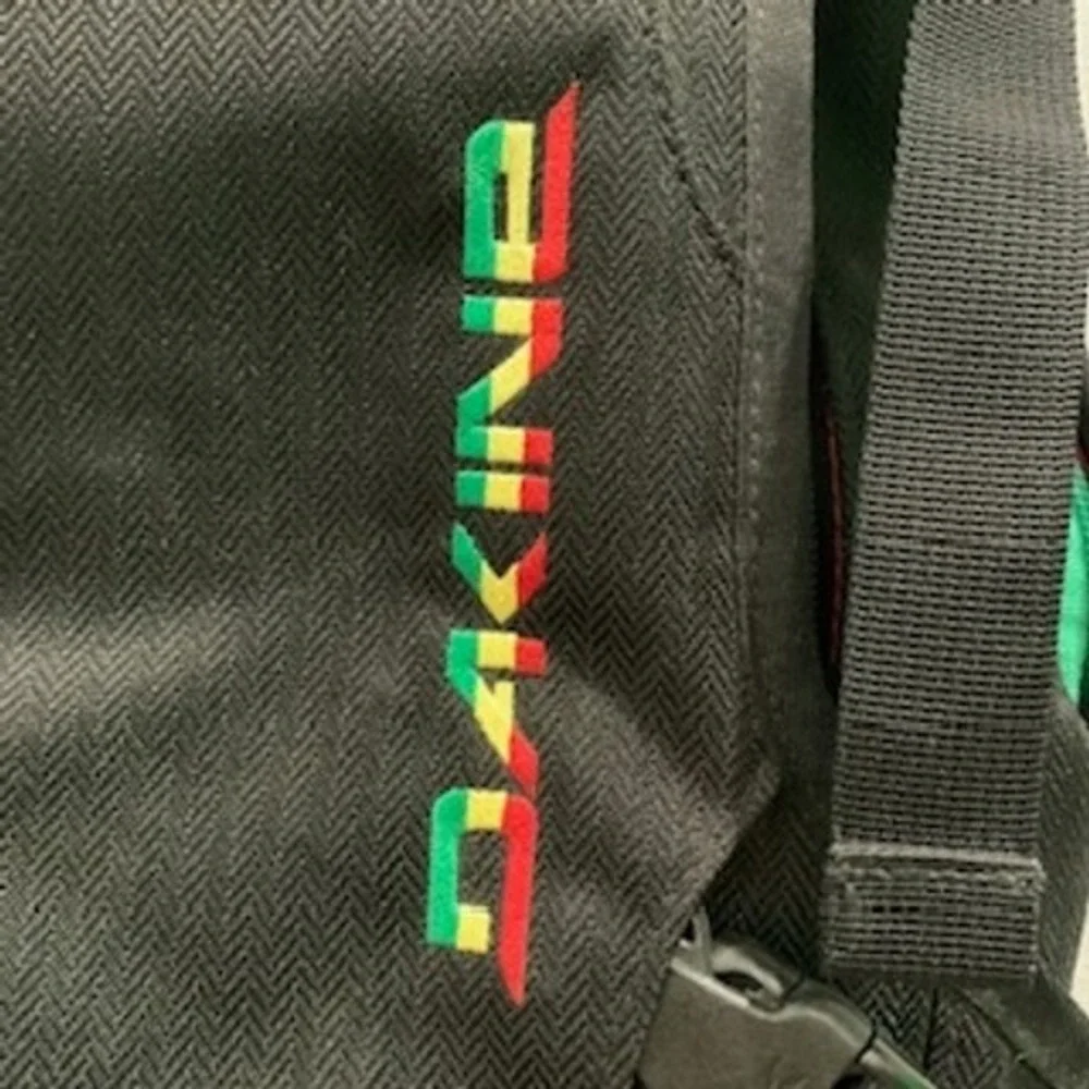 Dakine Heli Pack 11L Backpack Black Rasta Snowboard Ski Carry Daypack 8100700